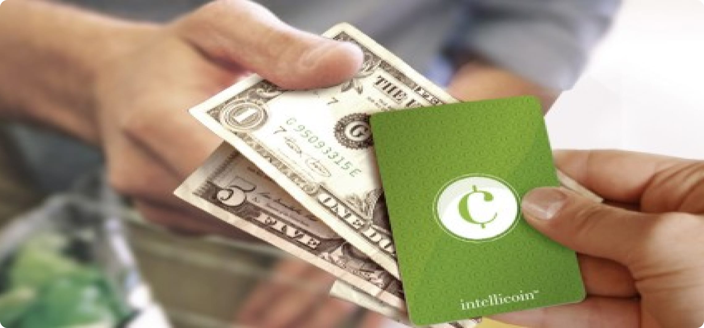 close-up of cash and hotel key